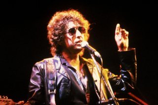 La première maison de Bob Dylan est à vendre à New York. Photo: Le musicien américain lors de son concert à l'Olympia à Paris le 23 juin 1981. KEYSTONE/STR